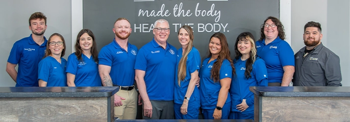 Chiropractor Louisville KY Dr. Lowe, Dr. Bentley, Dr. Tarullo With Team